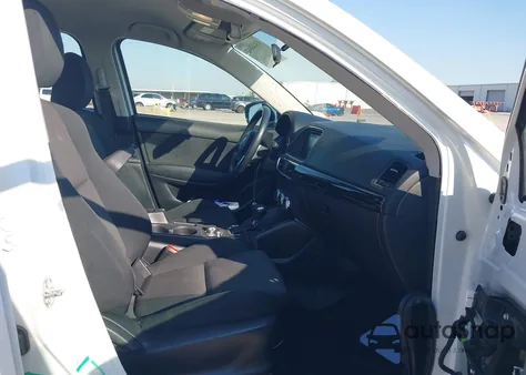 2016 Mazda Cx-5 Sport z USA, uszkodzony, nr VIN JM3KE2BYXG0860143